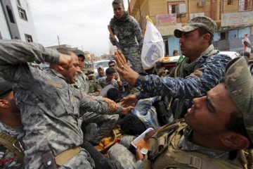 Milisi Syiah tinggalkan Tikrit setelah jarah kota ini