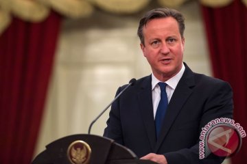 Cameron bersenandung setelah umumkan PM baru Inggris