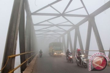 Maskapai rugi ratusan juta akibat asap