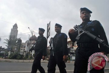 BOM JAKARTA - Markas Polda kini dijaga polisi senjata laras panjang