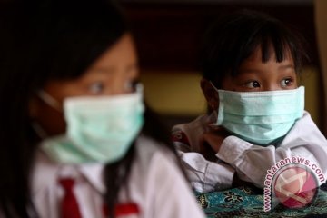 Tagana bagikan masker bagi warga terdampak erupsi Merapi