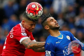 Manchester United tunda pesta juara Leicester setelah imbang 1-1