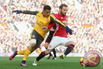 MU-Arsenal berbagi satu poin