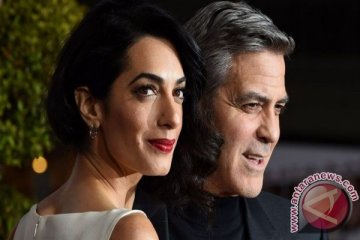 Istri hamil, George Clooney janji stop pergi ke daerah konflik