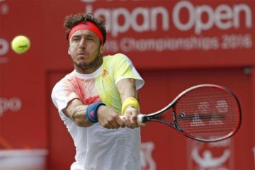 Juan Monaco gantung raket