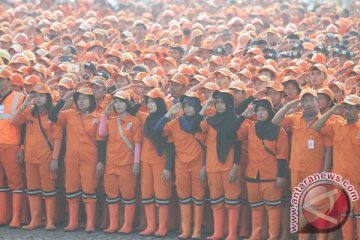 Ribuan "pasukan oranye" disiagakan selama musim hujan