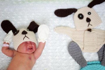 Rumah sakit Thailand dandani bayi baru lahir dengan kostum anjing