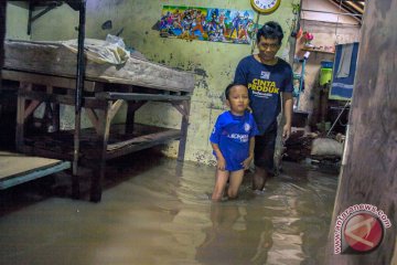 Kemarin, banjir longsor hingga KLB campak di Asmat berakhir