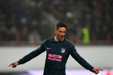 Pesta gol di Moskow, Atletico melenggang ke perempat final