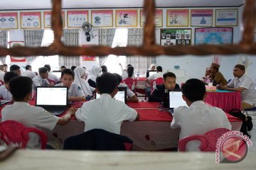 UNBK menggunakan laptop pinjaman