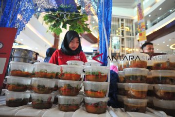 APJI  bagikan 1000 porsi pindang patin