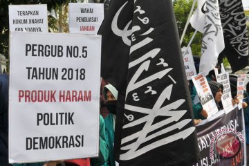 Aksi tolak Pergub hukum cambuk