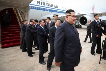 Kim Jong Un pakai Air China, Trump naik Air Force One