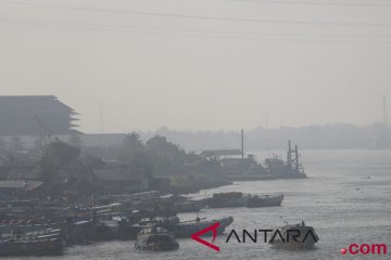 Palembang diselimuti kabut asap tipis