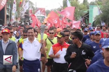 Menko Luhut  pembawa api obor Asian Games 2018 di Lombok