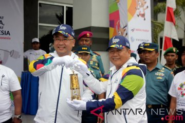 Menteri Desa Arak Api Asian Games