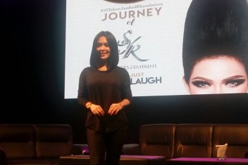 Konser tunggal, Syahrini kenakan "headpiece" terbesar di dunia