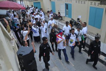 Obor Asian Games Singgah di Kampung Al Munawar