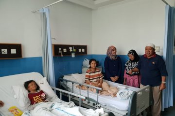 Empat anak korban tsunami telah berkumpul dengan keluarga