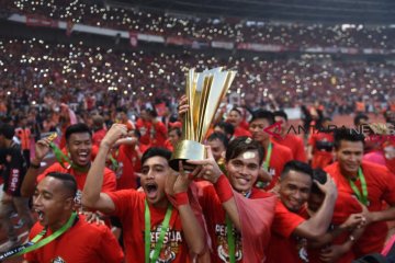 Pemain Persija Jakarta rayakan memori juara Liga 1 Indonesia 2018