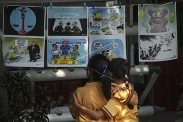 Pameran kartun hari antikorupsi