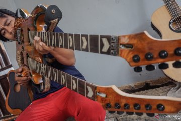 Perajin gitar elektrik