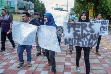 Aksi keprihatinan kekerasan terhadap wartawan