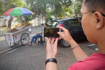 "Street photography" bisa keren meski cuma pakai smartphone