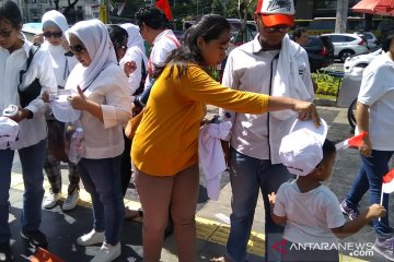 Penjual topi Jokowi kewalahan layani pembeli