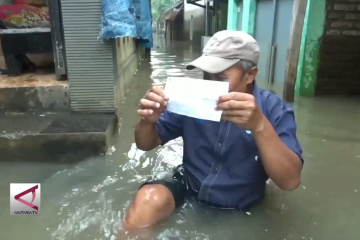 Warga terobos banjir demi salurkan hak politik