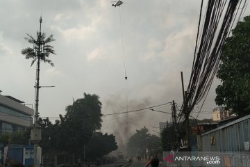 Helikopter guyur air di beberapa lokasi pembakaran