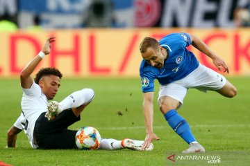 Aksi pemain Jerman saat melumat Estonia 8-0