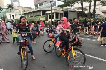 Perayaan HUT DKI Jakarta, warga serbu otopet listrik