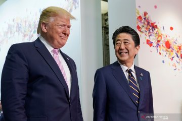 Shinzo Abe bertemu dengan Donald Trump dan Angela Merkel