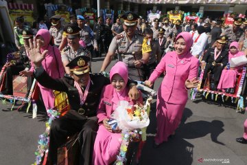 Pawai purna tugas polisi