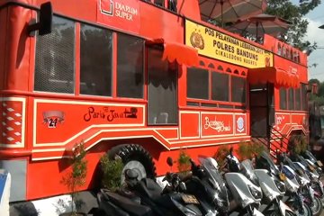 Posko mudik unik bertema bus wisata Bandros