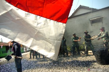 Perbaikan jalan desa pada program TMMD di Tegal