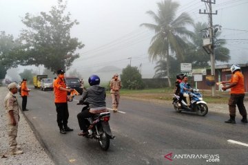 BPBD Dharmasraya bagikan masker gratis