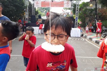 Warna-warni perayaan HUT Ke-74 RI warga Jalan Kramat V Kecamatan Senen