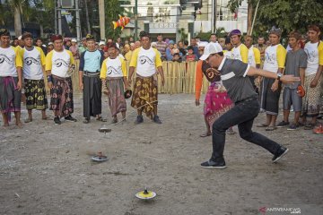 Olahraga tradisional gasing Lombok