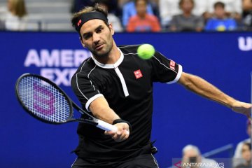 Kalahkan Evans, Federer mulus ke babak empat