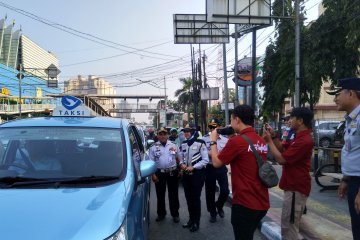 Perluasan ganjil genap, Sudin Perhubungan Jakut bagi bunga untuk warga