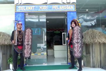 Peringati Hari Pelanggan dengan kenakan kostum Papua