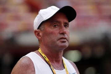 Pelatih lari AS dilarang empat tahun karena skandal doping