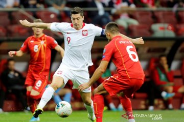Polandia lolos ke putaran final setelah bungkam Makedonia Utara
