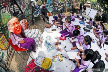 Melukis Wajah Presiden Terpilih