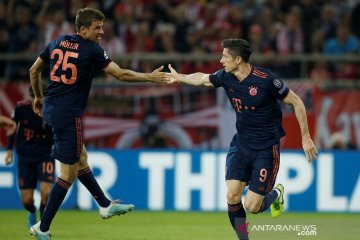 Lewandowski dua gol, Muenchen bekap Olympiakos 3-2