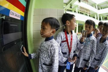 Tansaksi pembayaran berbasis digital di sekolah