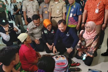 Ketika air kecokelatan menjadi momok pengungsi banjir Jakarta