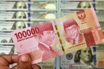 Rupiah Kamis sore menguat 55 poin, ditopang gagalnya pemakzulan Trump